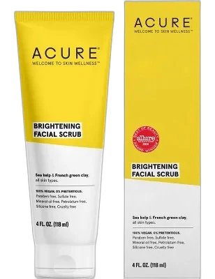 Acure Brightening Facial Scrub in a green squeeze tube with purple label