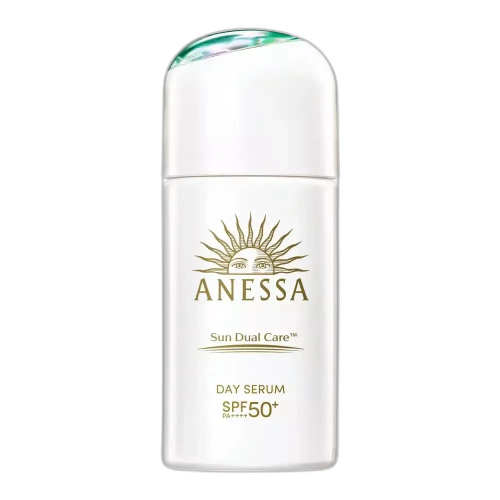 Anessa Day Serum Sunscreen SPF 50+ in a compact gold and white bottle with Japanese design