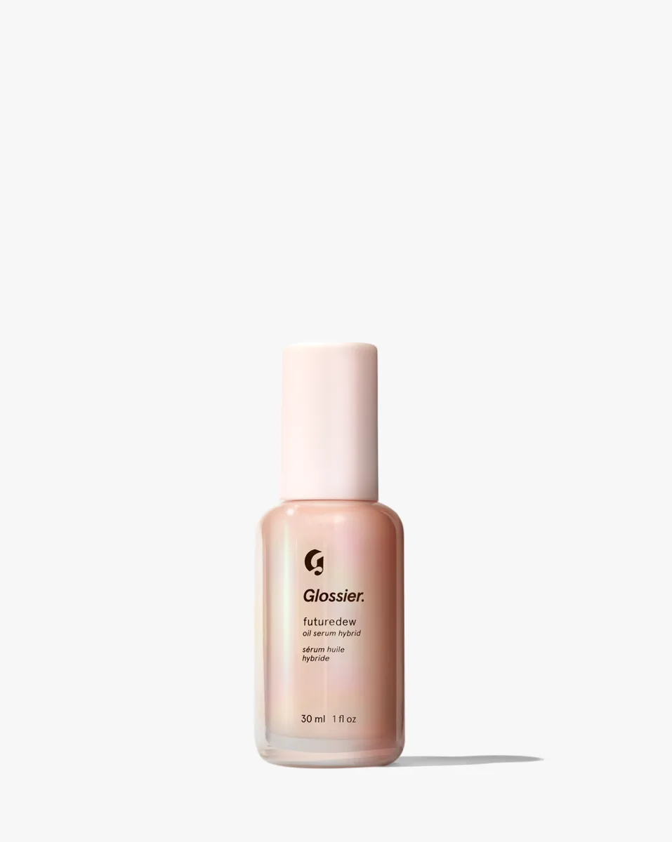 Glossier Futuredew Oil Serum Hybrid in a glass bottle with pump dispenser