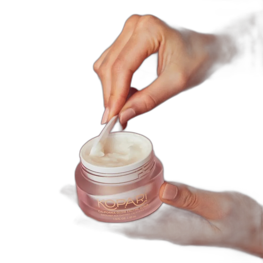 Kopari California Glow Enzyme Face Scrub in a small tube with tropical-inspired packaging