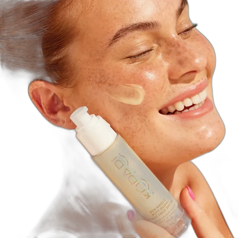 Kopari Sun Shield Soft Glow Daily Face SPF 30 in a small white squeeze tube with clean