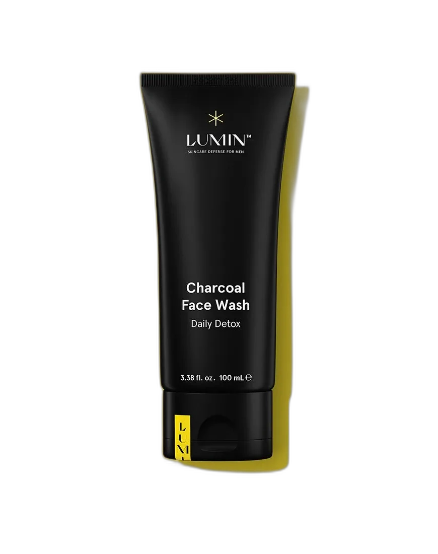 Lumin Charcoal Cleanser face wash in a dark compact tube