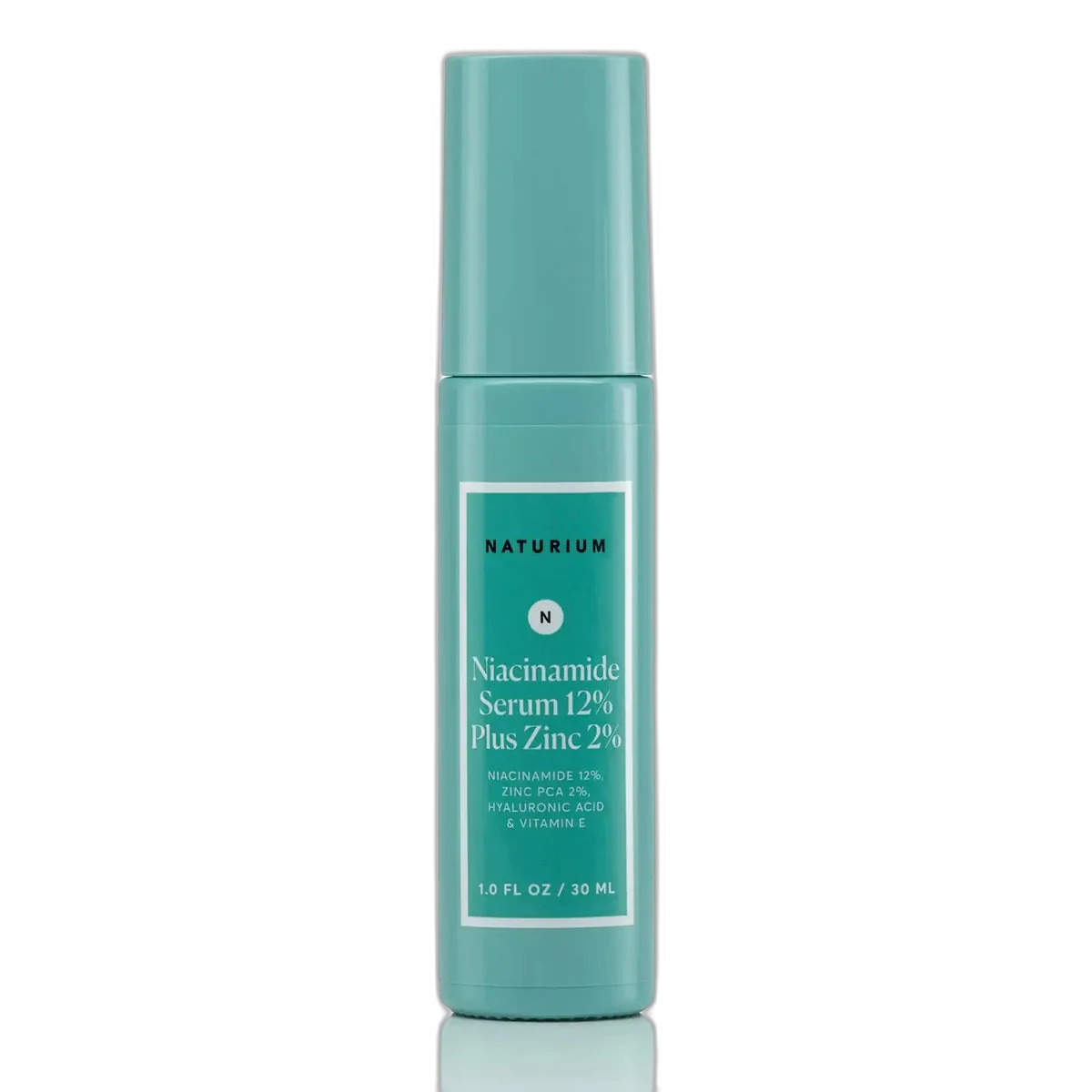 Naturium Niacinamide Serum 12% Plus Zinc 2% glass dropper bottle with minimalist white and