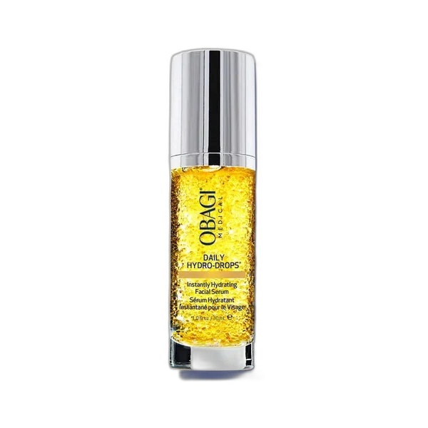 Obagi Daily Hydro-Drops Face Moisturizer in a glass bottle showing visible suspended oil droplets