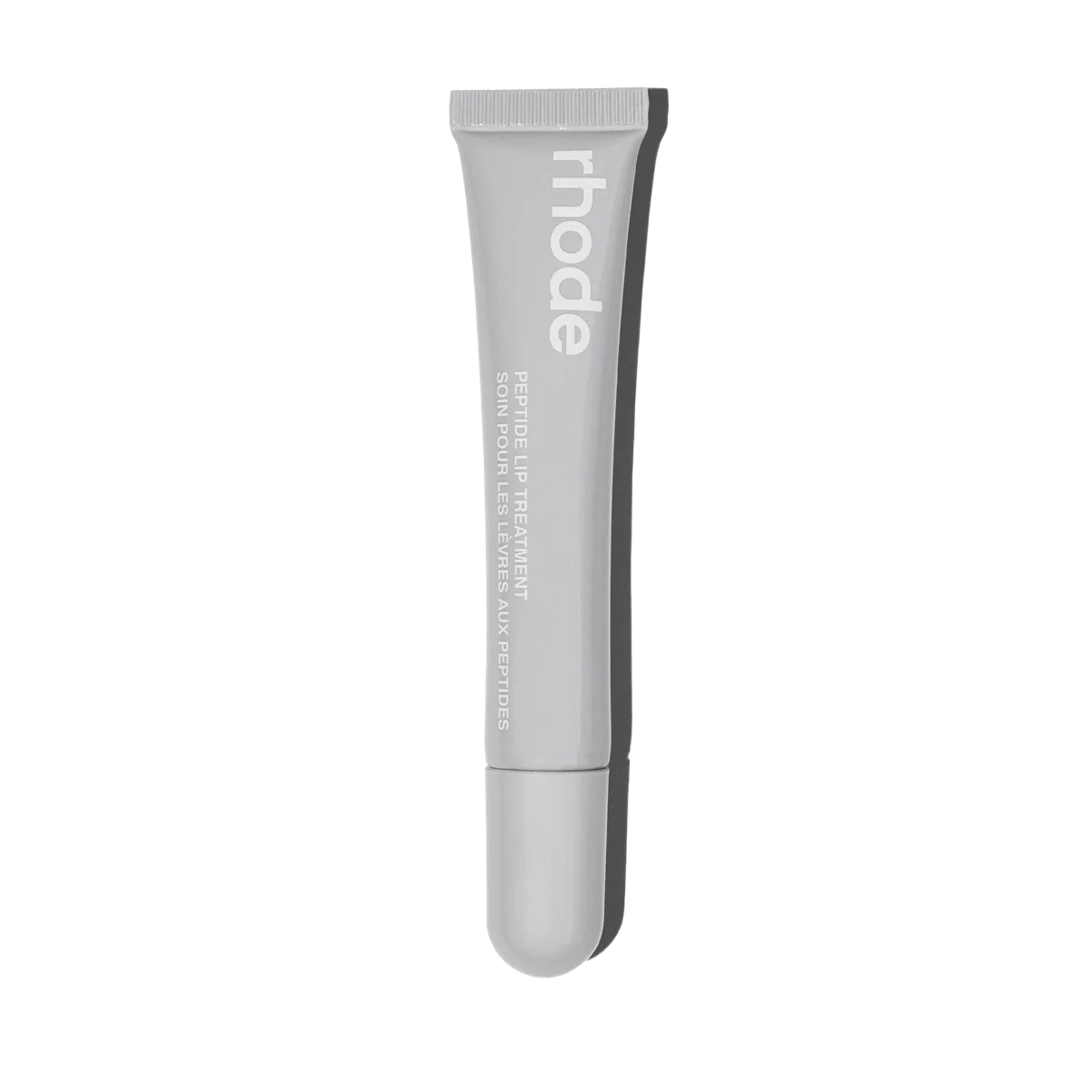 Rhode Peptide Lip Treatment lip balm in slim squeeze tube with slanted applicator