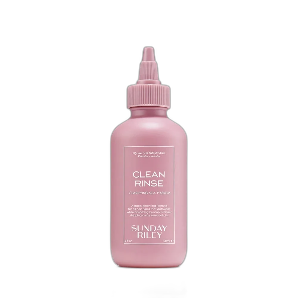 Sunday Riley Clean Rinse Clarifying Scalp Serum in a squeeze bottle with pointed nozzle applicator
