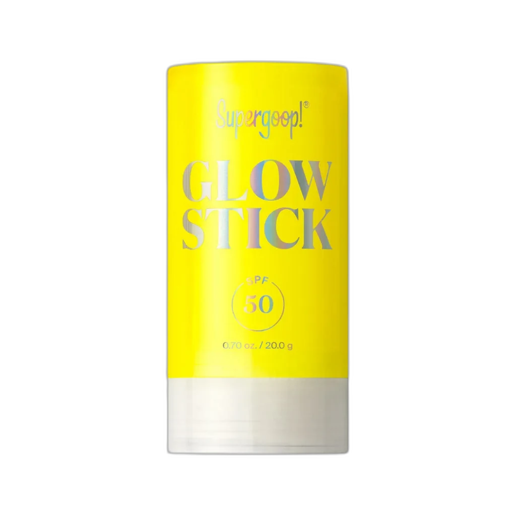 Supergoop Glow Stick SPF 50 clear twist-up tube showing golden sunscreen stick